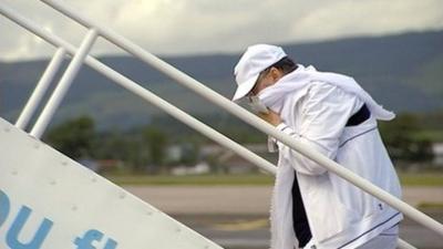 Abdelbaset al-Megrahi boarding a plane