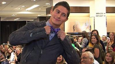 A male model wearing geek chic clothing