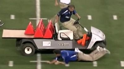 Men try to stop runaway golf cart