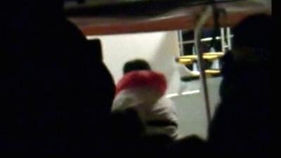 Passenger in life jacket