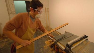 Man working with lumber