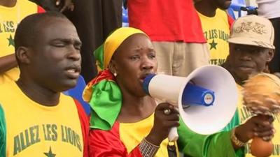 Senegal fans are cheering for their team