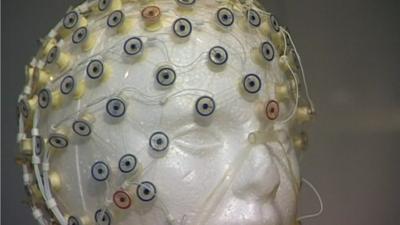 Model head with scanners attached