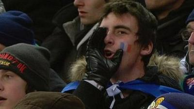 A French fan shows his displeasure