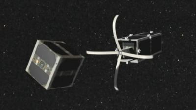 CGI of space junk cleaner