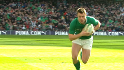 Ireland's Tommy Bowe scores a try against Italy