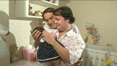 Mailton Alves and Wilson Albuquerque with their daughter