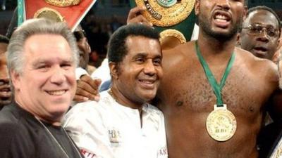 Emanuel Steward celebrates with former Heavyweight champion Lennox Lewis