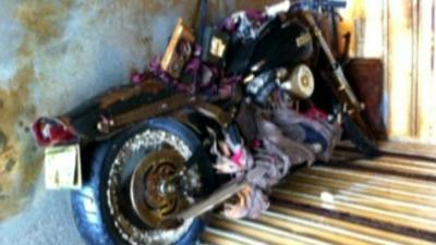 Rusty Harley Davidson inside trailer