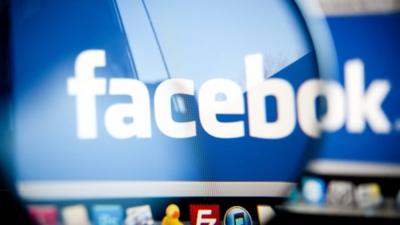 The Facebook logo on a computer screen