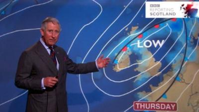 Prince Charles presents the weather forecast on BBC Reporting Scotland