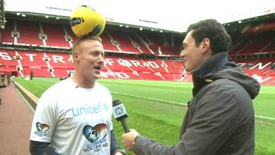 Joe interviews a man with a football on his head!