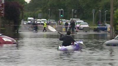 Canoe on a flooded road in Felpham