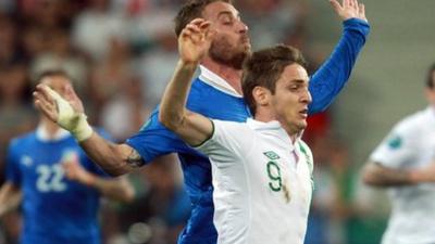 Kevin Doyle in action against Italy