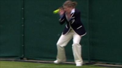 Wimbledon line judge hit by ball