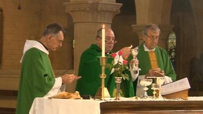 Vicars at an altar