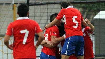 Chilean players celebrate their victory over Northern Ireland