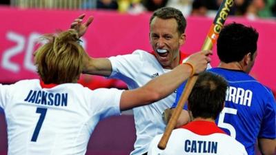 GB men's hockey team celebrate their win over Argentina