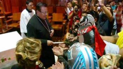 Some of the lucha libre wrestlers in church