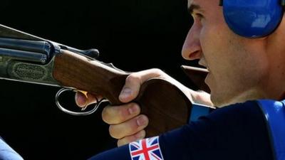 Peter Wilson in action during men's double trap competition