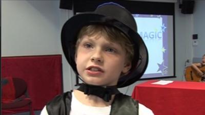 Children taught magic tricks