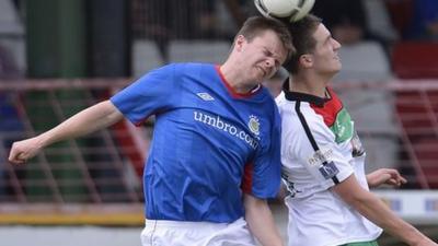 Match action from Glentoran against Linfield