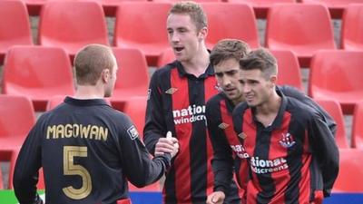 Timmy Adamson celebrates scoring the winning goal with team-mates