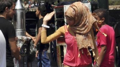 Woman in Cairo (photo taken in August 2012)