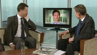 Nick Clegg watches a video of himself on The Andrew Marr Show