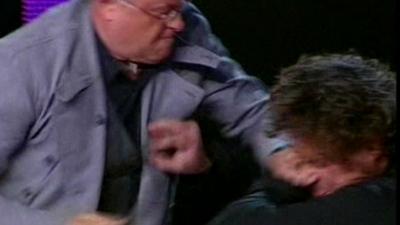 Russian billionaire Lebedev punching a fellow TV guest