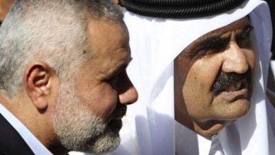 Gaza's Hamas Prime Minister Ismail Haniyeh with the Emir of Qatar Sheik Hamad bin Khalifa al-Thani