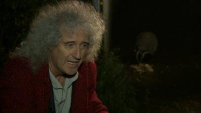 Brian May with badger