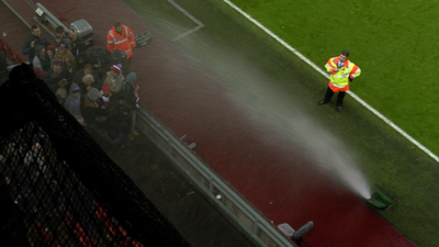 Liverpool fans get soaked by sprinkler