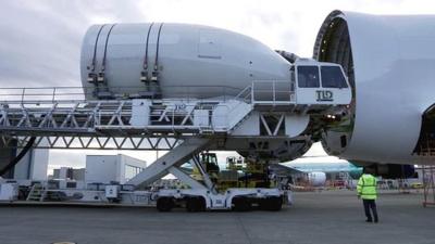 Nose cone being unloaded