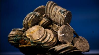 A block of encrusted silver coins from the shipwreck of the 1804 galleon