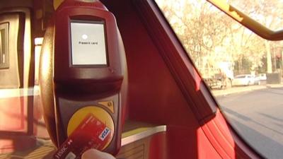 Contactless bank cards on London buses