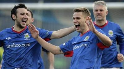 Linfield's Peter Thompson celebrates his goal against Dungannon Swifts