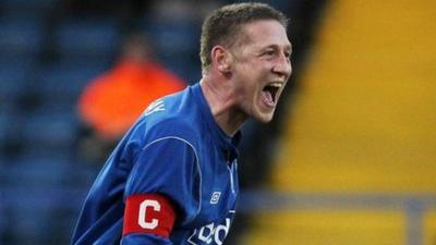 Glenavon captain Kris Lindsay celebrates his goal against Ballymena United