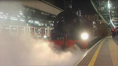 A steam train on the Underground