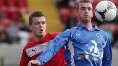 Match action from Cliftonville against Ballinamallard