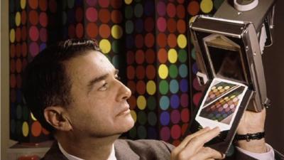 Edwin Land with a Polaroid camera