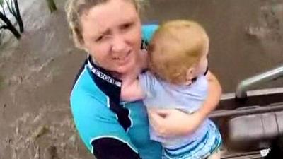 Woman and child preparing for airlift