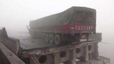 Truck on broken road