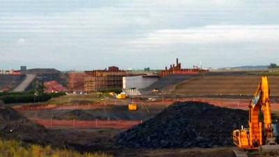 Diggers at work on the M9 junction 1A