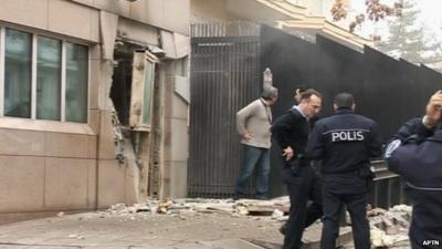 Emergency personnel are seen in front of a side entrance of the U.S. Embassy in the Turkish capital, Ankara,