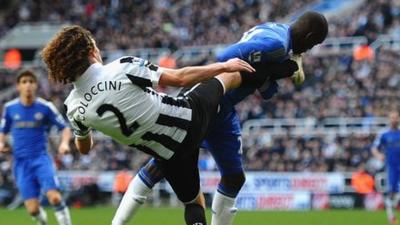 Fabricio Coloccini and Demba Ba