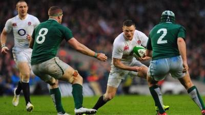 England wing Chris Ashton runs at the Ireland defence