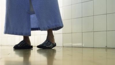 Elderly patient in gown.