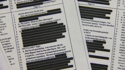 Pages of evidence with blacked-out sections
