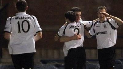 Distillery players celebrate the 2-1 victory over Dundela in the Irish Cup 6th round